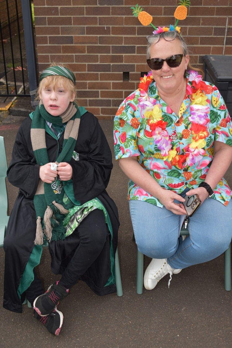 May be an image of 2 people