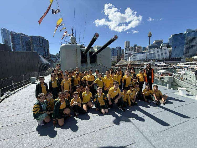 May be an image of 2 people and submarine